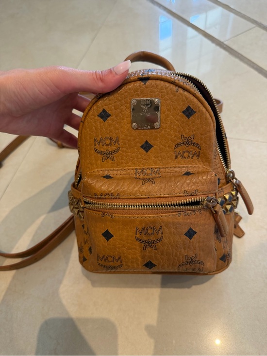MCM Handbags - MCM Cognac Logo Mini Backpack with Stud Accents